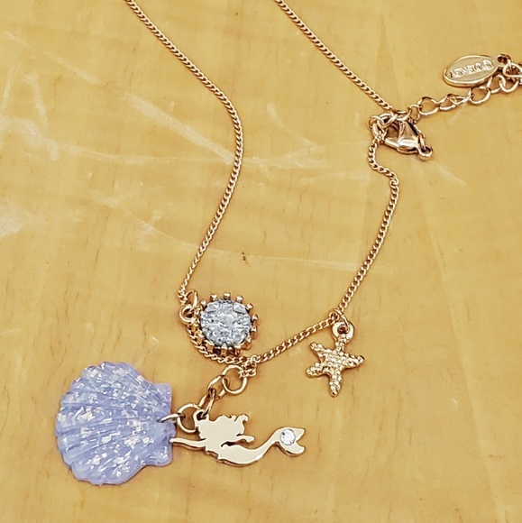 Disney Jewelry - DISNEY PARKS ARIEL SEASHELL STARFISH NECKLACE